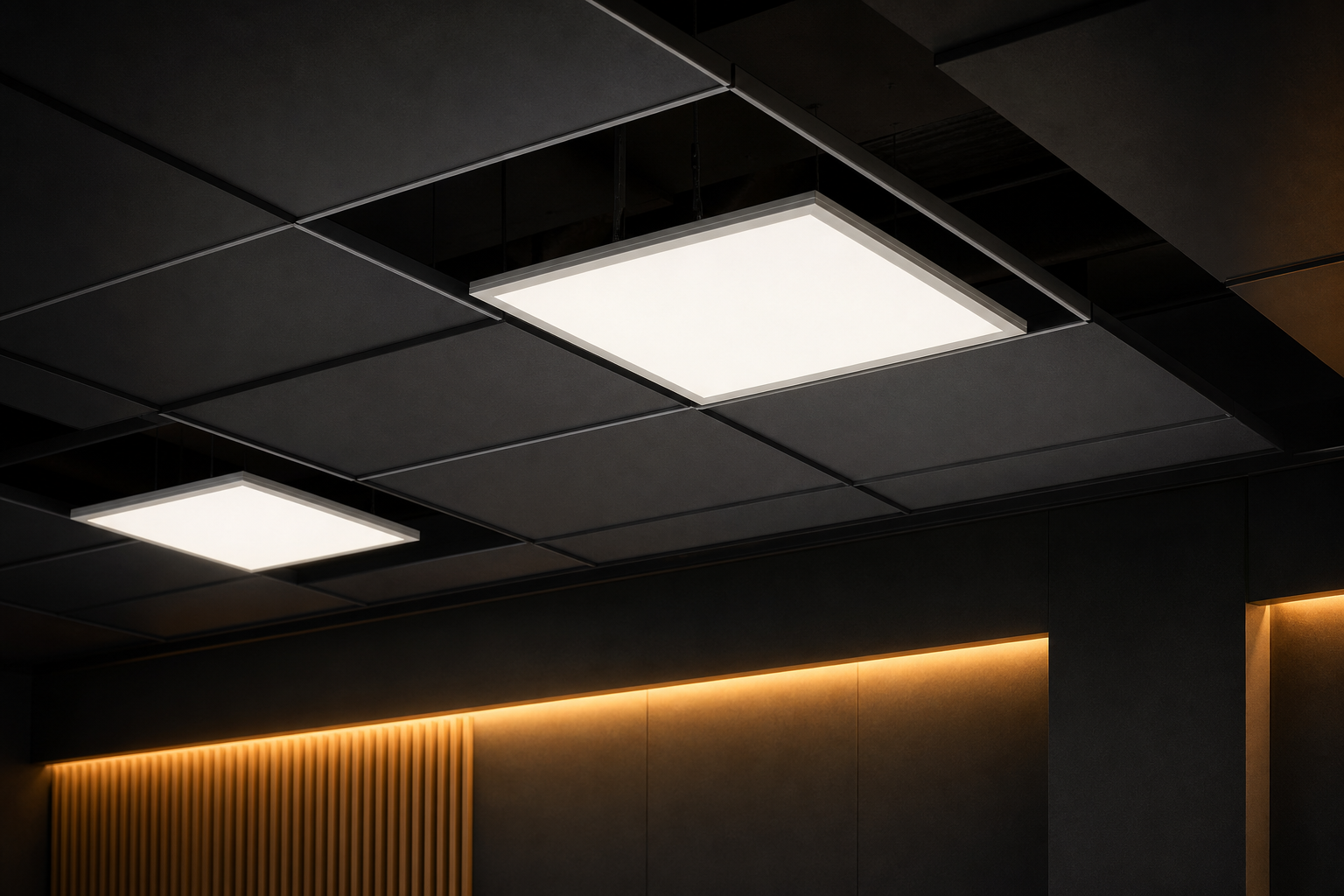 LED panel lights in a dark suspended ceiling with backlit glow